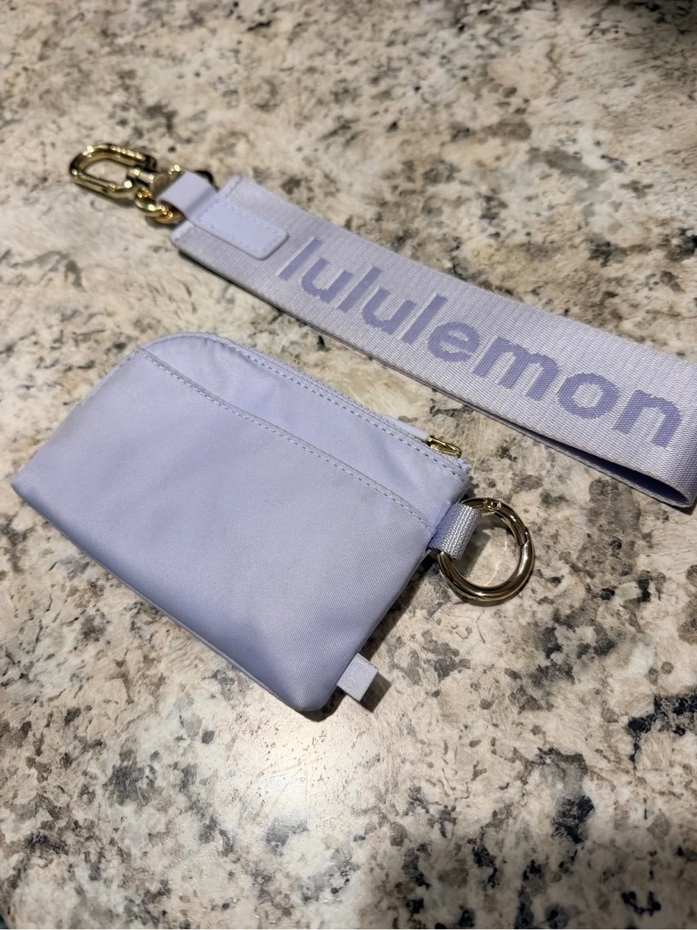 lululemon light lavender zip pouch with gold hardware